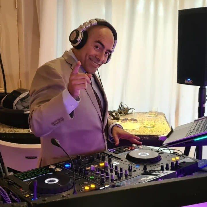 DJ Calmet at his DJ booth