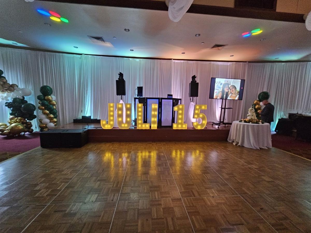 Quinceañera dance floor with lights set up by DJ Calmet